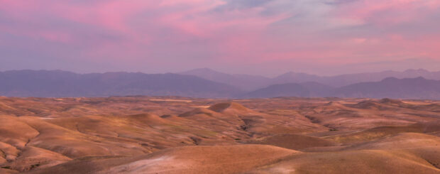 Traditional Berber camp in the Agafay Desert during camel trekking, Enjoy Agafay Desert landscapes