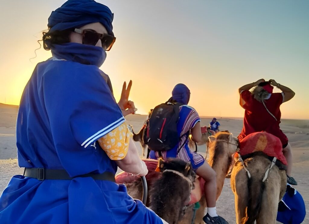 Camel ride through Agafay Desert at sunset