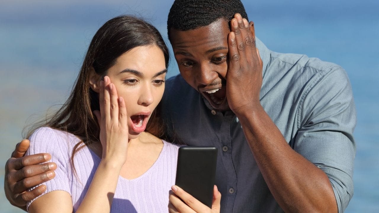 A couple checking prices for an Agafay Desert tour